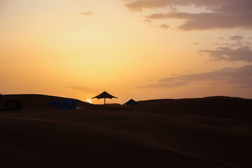 Fototapeta na wymiar Sunset in desert, Inner Mongolia, China