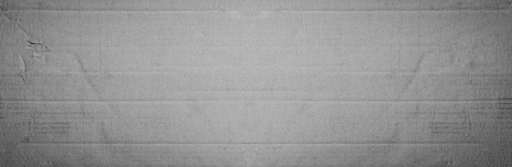 Old grey eco crumpled crate paper kraft wide background texture in soft white light for Panoramic page wallpaper design, gray rice matte organic pattern for decorative wall. Vintage decoration flat.