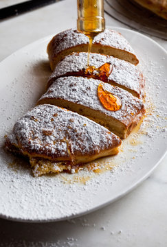 Cannoli&dagger;cream&dagger;calzone&dagger;with honey and orange