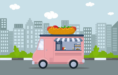 Pink food truck with Hot Dog. Mobile cafe in the city
