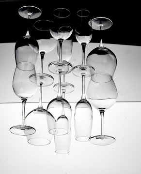 Reflection of empty drink glasses on table