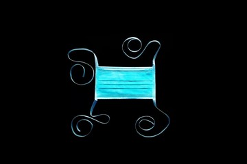surgical mask with tie-on on black ground