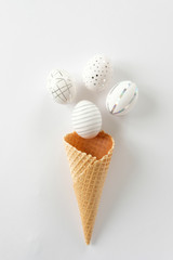 White easter eggs with silver pattern on white