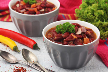 Two bowls with traditional Georgian dish - lobio