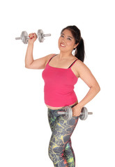 A young Asian woman exercising with two dumbbells