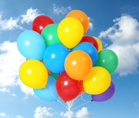 Fototapeta na wymiar Many colorful balloons outdoors on sunny day
