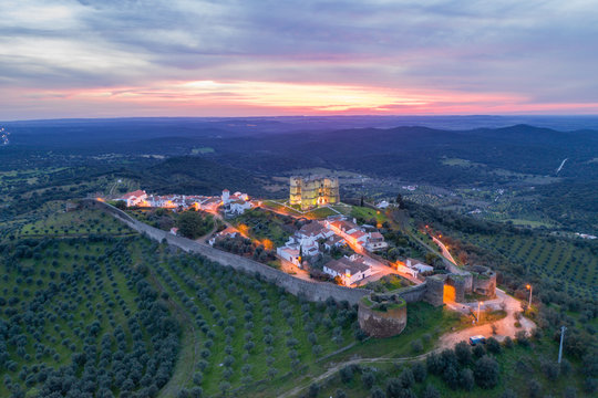 Evoramonte drone aerial view of village and castle at sunset in Alentejo, Portugal
