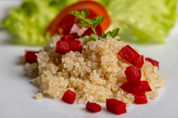 closeup of a quinoa salad with bell pepper