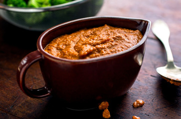 Romesco†sauce in gravy boat