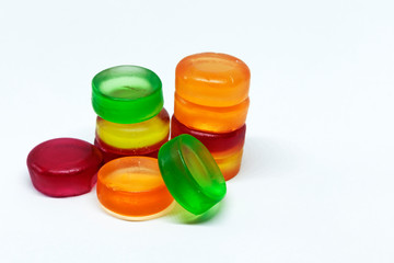 a pile of soft and colorful candies on white background