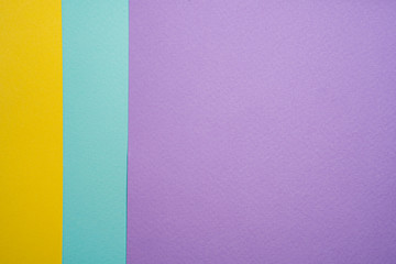 Colored background. Multicolored sheets of paper.