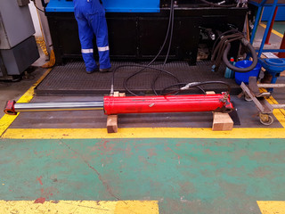 Hydraulic cylinder being tested after repair