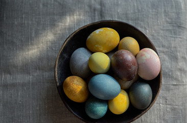 Easter. Naturally colored eggs background. Selective focus.