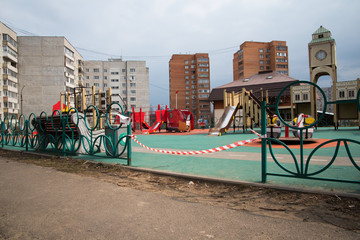 The tape covers the Playground. Closed for quarantine. Preventing the spread of pandemics.