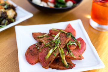 Cocktails at a restaurant with food and beautifully plated food