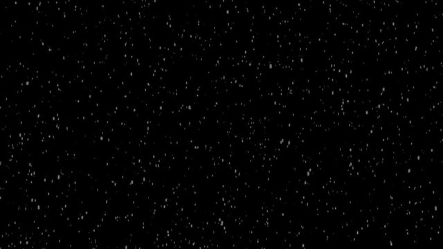 Snowfall, falling snow flakes. Normal speed animated video in isolated black background.
