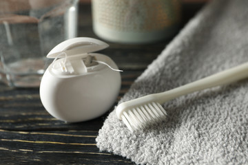 Tools for dental care on wooden background, close up