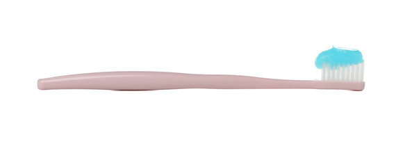 Toothbrush with toothpaste isolated on white background