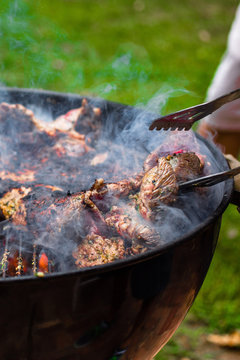Barbecued garlic and herb rubbed lamb