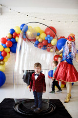 Obraz na płótnie Canvas Bubbles show, entertainment for kid's birthday party