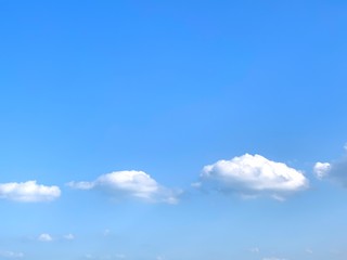Blue sky with white clouds background image