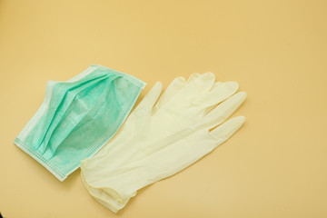 single green paper mask surgical on latex glove protect and filter dust pollution and disease...