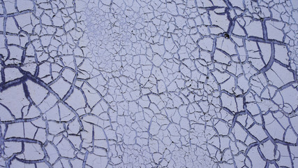 Light texture of old cracked paint on the wall. square cracks on the old wall, grunge