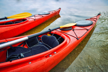 Traveling by river in early spring on a kayak.