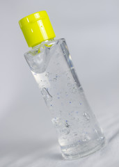 Disinfectant for covid viruses transparent with white and yellow lid