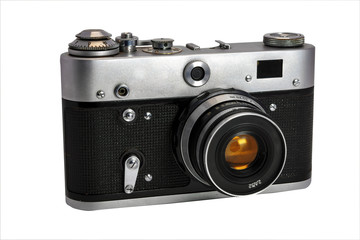 Old film camera isolate on a white background close-up.