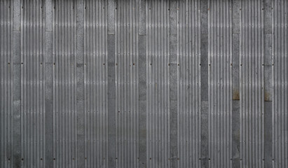Gray metal decking. Sheets of gray corrugated iron