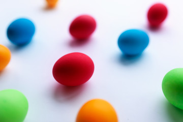Vibrant multicolored Easter eggs on a white background