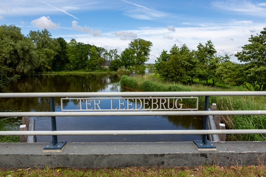 The Ter Leedebrug on the van pallandtlaan (N208) in the village of Sassenheim. View on the old swimming pool. The Netherlands.
