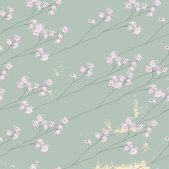 delicate floral cherry blossom pattern on vintage gold foil textured background 