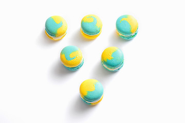 fresh colorful macarons isolated on white