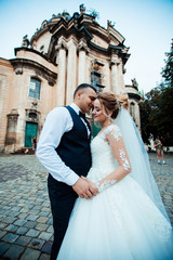 Naklejka premium Happy bride and groom after wedding ceremony