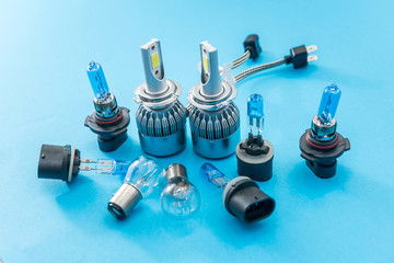 Halogen diod car bulb isolated on color background for repair. modent equipment for headlight
