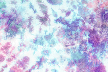 tie dye pattern hand dyed on cotton fabric abstract texture background.