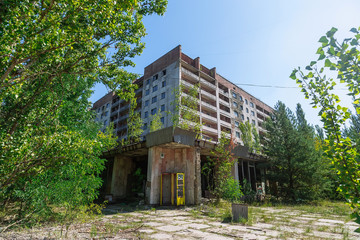 Phone box near abandoned building in centre of ghost town Pripyat Chornobyl Zone