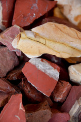 close-up of small stones in shades of red