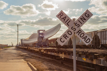April 7, 2020 - Galveston TX/USA: Wind turbine blade on railroad train flatcar at the Port of Galveston Texas