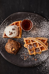 waffle with ice cream and caramel sauce..