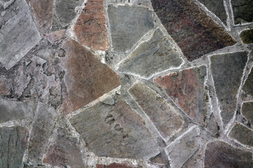 masonry wall paving stones as a background close up