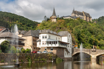 Fototapeta na wymiar Vianden castle above valley and river Our in Luxembourg