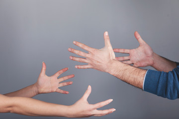 angry woman and man  gray background