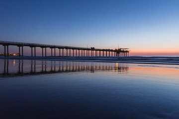 Fototapeta na wymiar pier on the sea at sunset