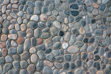masonry wall paving stones as a background close up