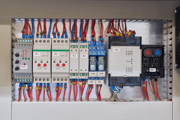 Digital input module, voltage, skew and phase sequence relay, level relay, thermistor protection relay, intermediate relays and thermostat in the electrical Cabinet.