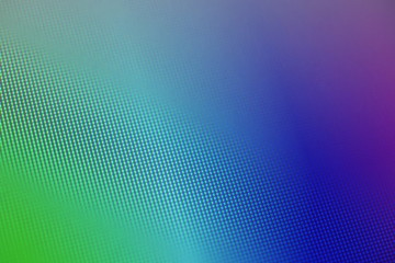 Display pixels multi-colored background. Macro closeup blurry monitor texture.