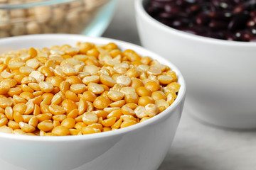 Beans assortment on white stone table